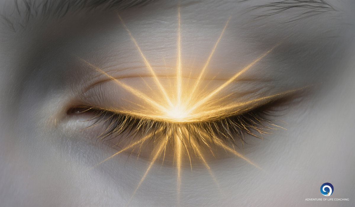 Ein geschlossenes Auge, ein Lichtstrahl auf dem Lid. Blog: Schlüssel zur Urwunde. Kerstin Schuster, Adventure Of Life Coaching