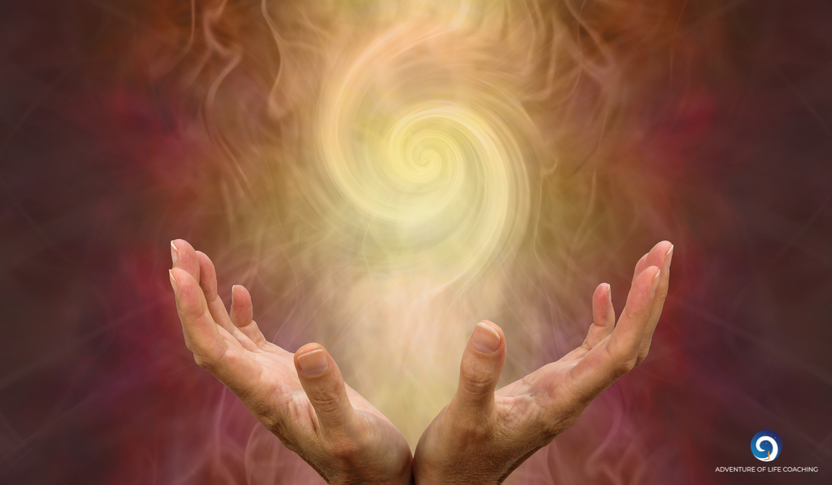 Zwei Hände und ein Wirbel aus Licht. Blog: Schlüssel zur Urwunde. Kerstin Schuster, Adventure Of Life Coaching
